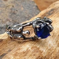 Skelett Ring "BEINAGRIND" aus Edelstahl mit blauem Zirkonia