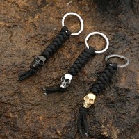 Paracord Schlüsselanhänger mit Totenkopf aus Edelstahl - Farbe schwarz/silber
