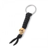 Paracord Schlüsselanhänger mit Totenkopf aus Edelstahl - Farbe schwarz/gold