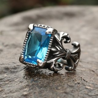 Fleur-de-Lys Ring aus Edelstahl mit blauen Glasstein